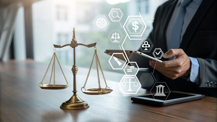 A professional analyzing legal and financial data on a tablet with a scale of justice in the...