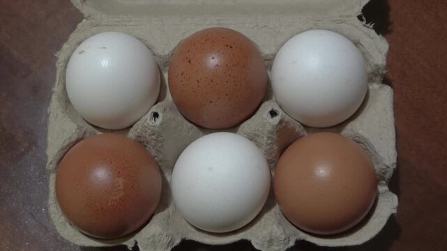  Fresh Ingredients for Cooking: Close-up of Natural Farm Eggs in an Open Crate.

