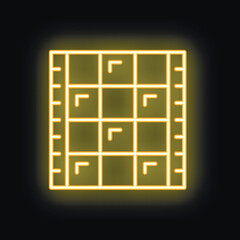 Neon yellow film strip glowing on a black background, representing the concept of cinema and entertainment