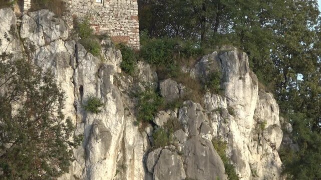 Close-up of the cliffs and a piece of the wall of the Benedictine Abbey, Krakow, Poland, ground shot