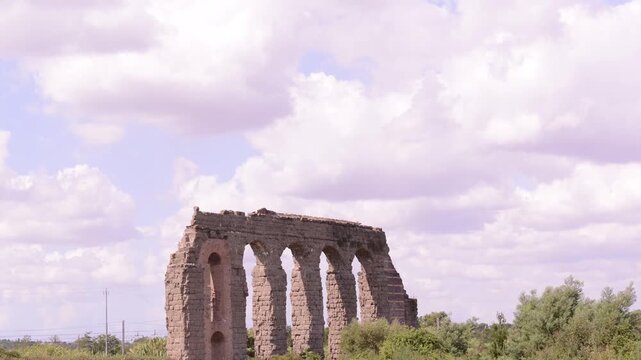 timelaps.panorama of a park in Rome with Roman aqueducts