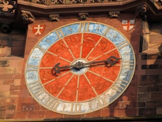 Obraz premium Telephoto detail of the astronomical clock inside Freiburger Münster, created around 1500 and restored in 1972. Medieval zodiac dial within Gothic cathedral interior, DE, 02 Mart 2011
