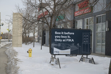Fototapeta premium mobile roadside billboard outside FIKA Cannabis located at 1025 Lake Shore Blvd E (inside Canadian Tire Auto Service), at Leslie St, Toronto