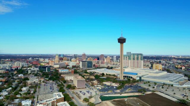 Aerial view of downtown San Antonio syline visible in the distance.