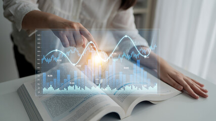 A person explores data and insights with a light bulb moment, blending education and innovation...