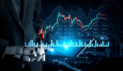 A robotic hand holds a tablet showcasing stock market data with vibrant trend graphs against a...