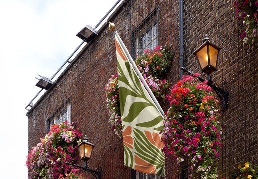 Real photo of Flowers and a Blank Flag in Dublin City. PSD mockup Templates