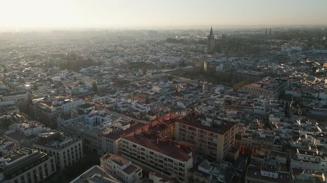 Panning video captures a picturesque city panorama od Seville, Andalusia province, southern Spain. Aerial perspective.
