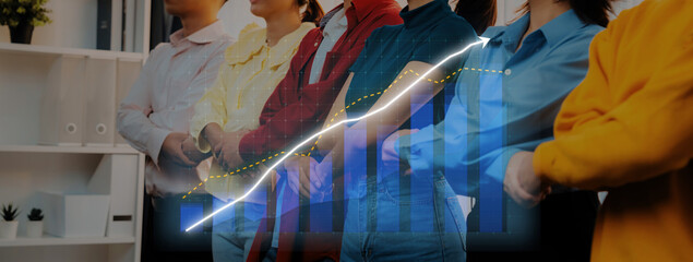 A group of business professionals stands together, symbolizing teamwork and growth, with a graph overlay showcasing rising success and progress in the workplace. Axiom © InfiniteFlow