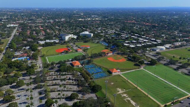High altitude aerial view of Coral Springs Florida sports complex and suburb