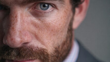 Fototapeta premium Close-up Portrait of a Man with Freckles