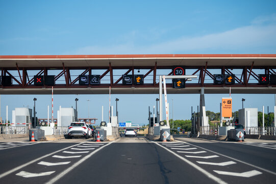 Scenic highway journey along A9 motorway, featuring toll barriers, connecting major cities from Montpellier to Lyon, with traffic flow and road infrastructure