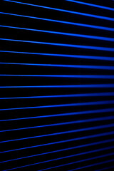 Obraz premium Blue neon lines in dark space. Neon lines.