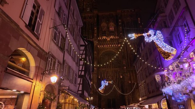Street view around the old town of the city Strasbourg in France around  the Christmas market on a late afternoon in December.
