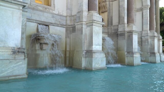 The Acqua Paola fountain, a monumental fountain located on the Janiculum hill in Rome, Italy. Water gashes into the pool.
