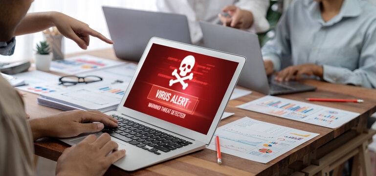 Virus warning alert on computer screen detected brisk cyber threat , hacker, computer virus and malware