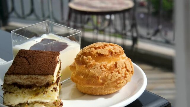 Three types of dessert, creme brulee, tiramisu, and custard, yogurt with chocolate. High quality 4k footage