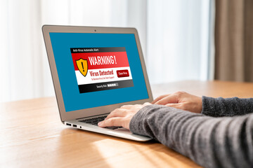 Virus warning alert on computer screen detected modish cyber threat , hacker, computer virus and malware