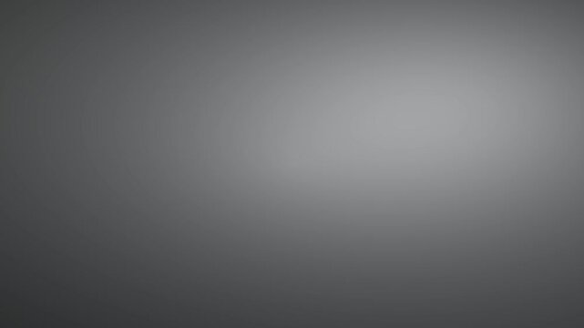 Abstract Gray Background with Subtle Light Gradient and Pixelated Texture.