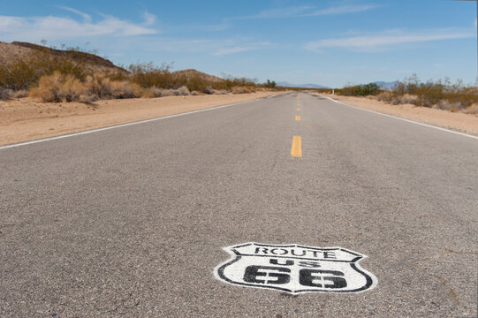 USA, California, Goffs.  Route 66 sign painted on the highway.