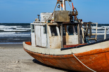 Artisanal fishing boat resting on the beach in Cabo Polonio, Uruguay.