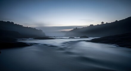 Obraz premium Serene River Flowing Through Misty Hills at Twilight, Long Exposure Nature Landscape