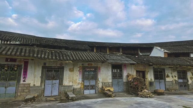 Interior Courtyard Of Fujian Tulou In The Mountainous Regions Of Fujian Province, China. Pan Left Shot