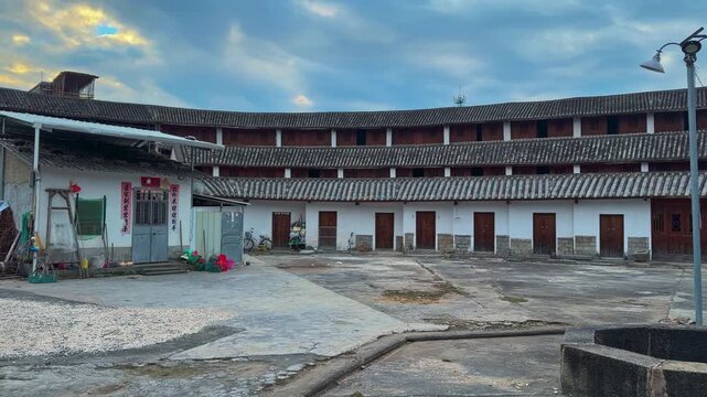 Dwellings In The Inner Courtyard Of Daoyunlou, Octagonal Hakka Earth Building In Raoping, Chaozhou, China. Pan Right Shot