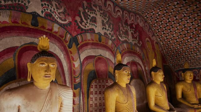 Detailed wall paintings, murals and religious Buddha statues at Sri Lanka&rsquo;s Dambulla Cave Temple