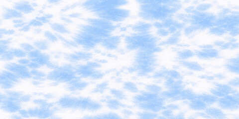 A beautiful summer cloudscape features fluffy white clouds drifting through a clear blue sky, where bright sunlight illuminates the natural atmosphere of a sunny day © Graph Rover