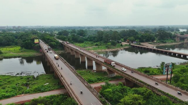 Aerial View of Kharun Nadi River Bridge, Drone Shot of Raipur Bhilai Highway Over Water, Green Landscape with Long Bridge, Rural India Bridge Aerial