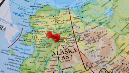 Naklejka premium View of Fairbanks, is a home rule city and the borough seat of the Fairbanks North Star Borough, Alaska, United States, on a geographical map of America, marked with red push pin