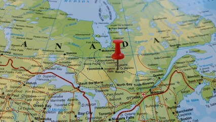 Naklejka premium View of Rouyn-Noranda, City in the province of Quebec, Canada, on a geographical map of America, marked with red push pin