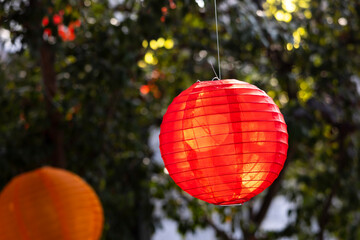 Colorful lanterns hung outdoors for a festive celebration