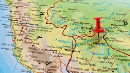 Naklejka premium View of Riberalta, is a town in the Beni Department in northern Bolivia, On a geographical map of America, marked with red push pin
