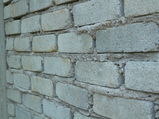 Obraz premium A brick wall with clean structure and uniform mortar lines