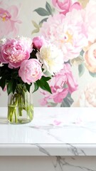 Fototapeta premium A bouquet of pink and white flowers on a white surface