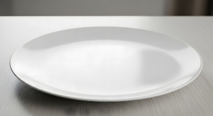 White plate on light wood grain surface