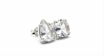 Elegant quartz earrings with teardrop design isolated on a pristine white background, showcasing sparkling clarity and sophisticated craftsmanship