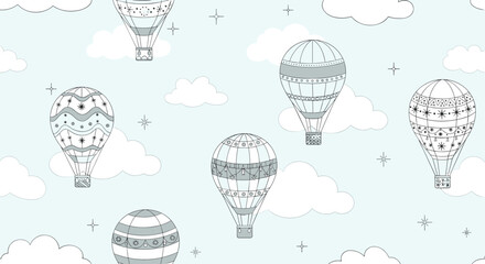 Dreamy seamless pattern featuring various patterned hot air balloons floating among soft clouds and stars on light blue.