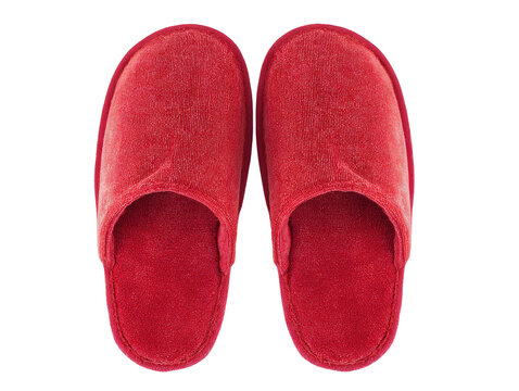 Two soft, plush, vibrant red house slippers, offering cozy comfort, isolated from above