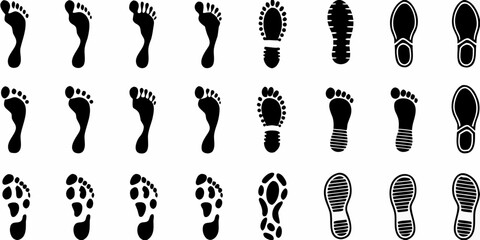 Collection of black footprints and shoe prints on a white background