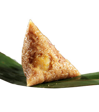 Zongzi. Rice dumpling for Chinese traditional Dragon Boat Festival (Duanwu Festival) on dark wooden table background.