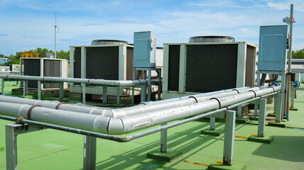 HVAC (Heating, Ventilation, and Air Conditioning) units installed on the rooftop of a modern building,