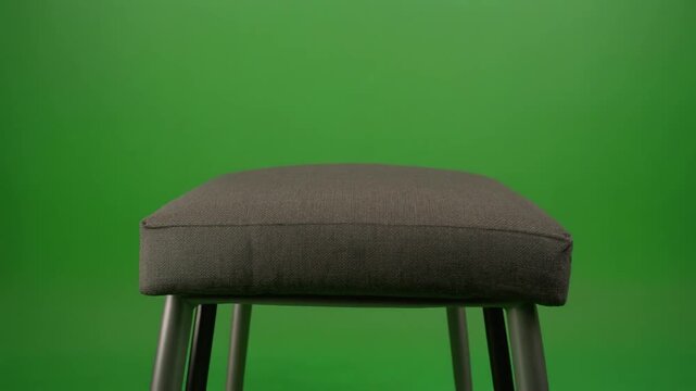 Modern Greenscreen office chair minimal office interior corporate furniture swivel caster seat clean chroma background mockup element for branding advertising and digital content