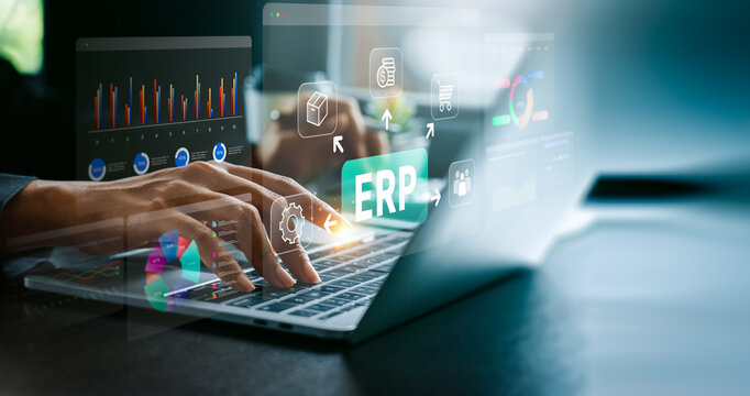 Business professional working on enterprise resource planning system with digital ERP interface, data analytics dashboard, integrated business process management, automation workflow, organizational