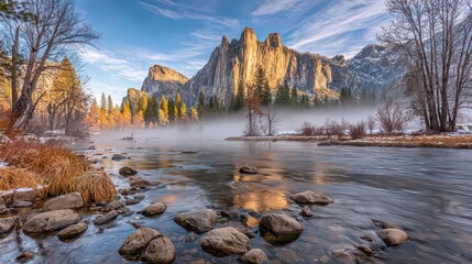 Scenic Mountain River Landscape with Mist Covered Water and Golden Light Illuminating Rock Formations and Surrounding Trees at Sunrise or Sunset