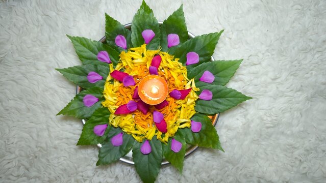 Arti thali decoration with fresh flowers. Traditional puja thali decor