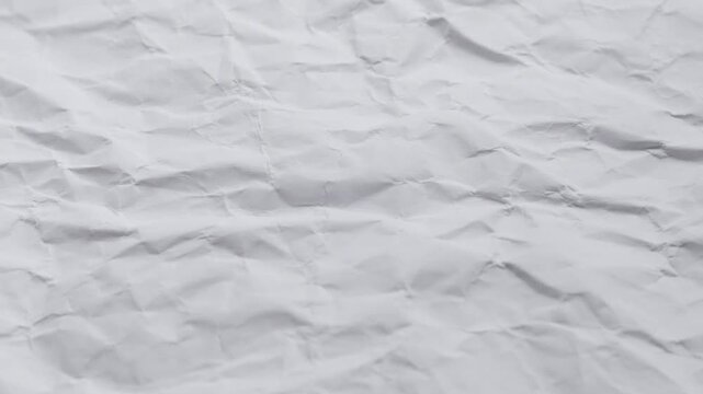 White Stop Motion Real Crinkled Paper Texture. Organic, tactile texture is perfect for overlays, transitions, or as a background for sketchy typography and hand-drawn animation.