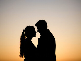 silhouette of a couple kissing